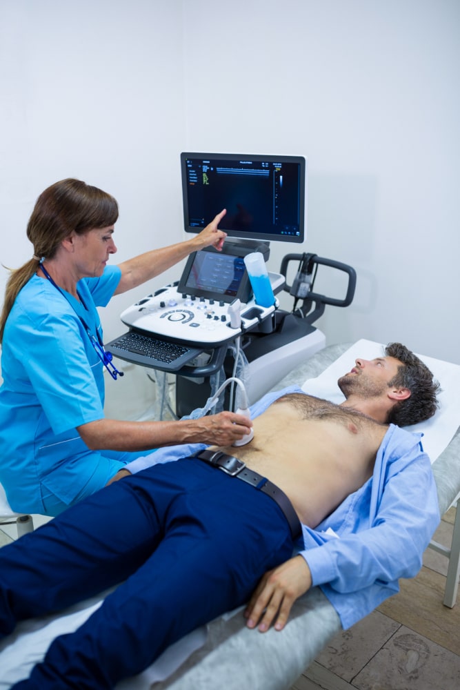 doctor performing EUS procedure on patient