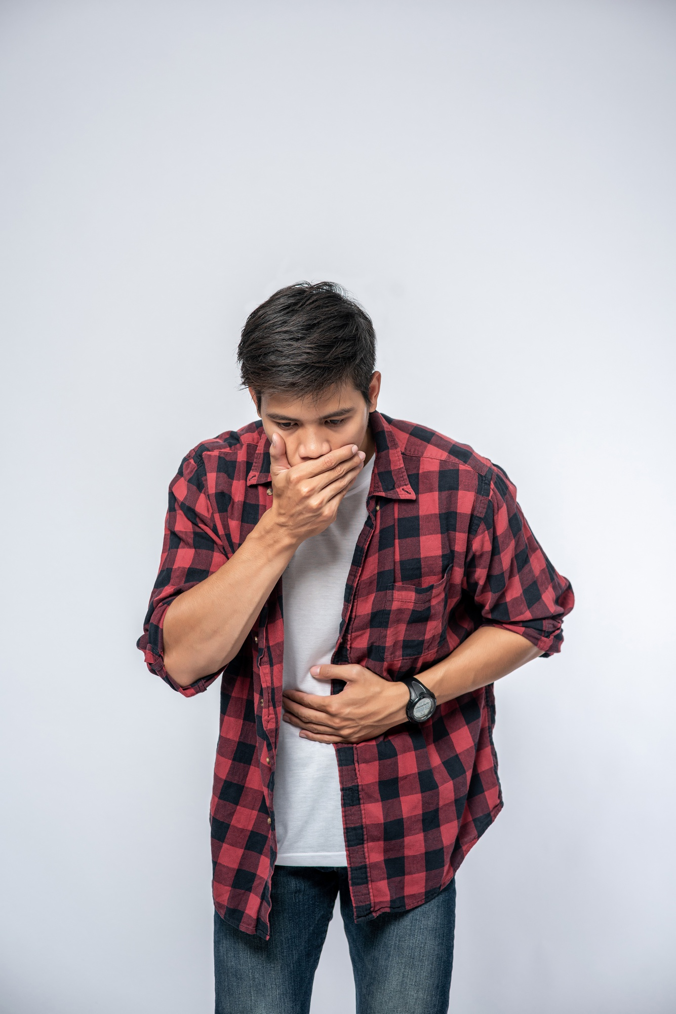 male patient with Crohn's disease about to vomit